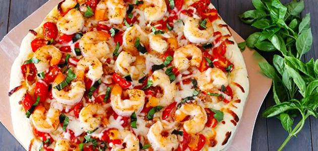 طريقة عمل بيتزا بالجمبري صورة مقال طريقة عمل بيتزا بالجمبري