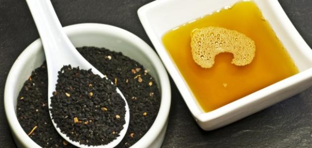 فوائد زيت حبة البركة وزيت الزيتون للشعر صورة مقال فوائد زيت حبة البركة وزيت الزيتون للشعر