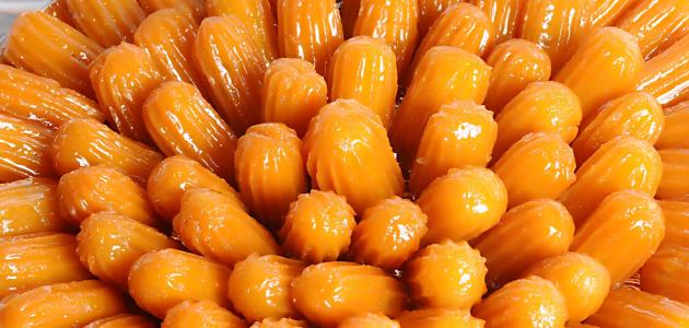 طريقة عمل بلح الشام بالسميد صورة مقال طريقة عمل بلح الشام بالسميد